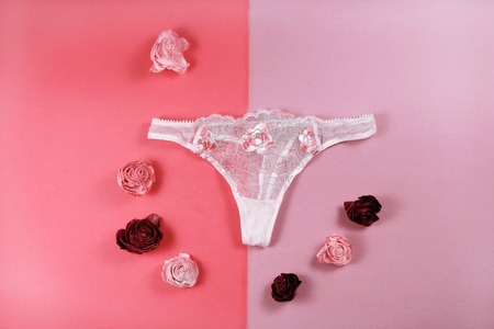 Lace panties on pink background, fashion conceptの写真素材