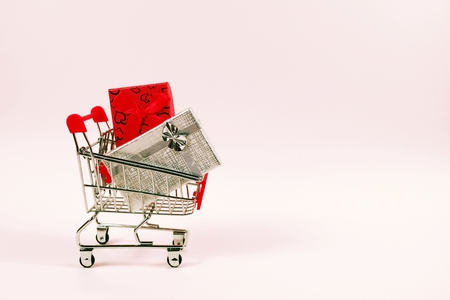 Online shopping concept, shopping cart with gift boxesの写真素材