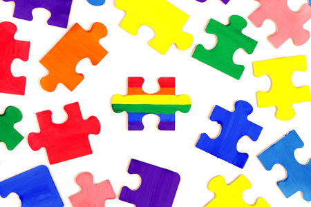 LGBT concept. Rainbow colored puzzle isolated on white background. Gay Pride. Concept of equality, acceptance of sexual minorities lesbian, gay, bisexual, transgenderの写真素材