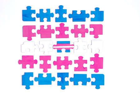 Transgender concept. Blue pink and white colored puzzle isolated on white background. Concept of equality, acceptance of sexual minorities lesbian, gay, bisexual, transgenderの写真素材