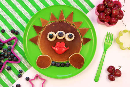 Funny Halloween breakfast for kids. Fun monster girl pancakes.の写真素材