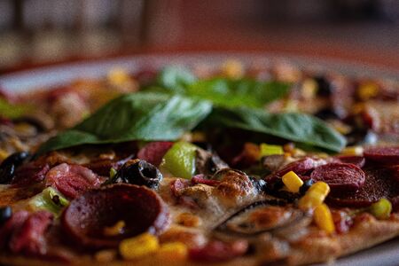 Italian Pizza with the mixed topping, ideal for background useg, restaurant back ground, italian restaurantの写真素材