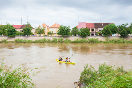 Battambang, Cambodia â SEPTEMBER 21, 2013: Tourist enjoying kayaking in Sangkae River. Battambang Province.のeditorial素材