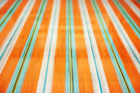 Close-up shot of cotton weaving characteristic of Thai textiles, simple and elegant pattern, traditional Thai weaving. Selective focus.の写真素材