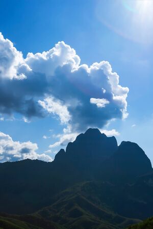 Stunning scenery of Phu Pha Chao mountain on winter morning, dramatic cloudy over the mountain, Phu Pha Chao is 20th high mountain in Laos.の写真素材