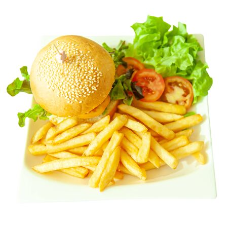 Healthy vegetarian burger with salad and fries on white plate isolated on white backgroundの写真素材