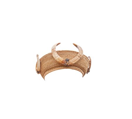 Kachin or Jingpo traditional rattan hat with tusks of a wild boar, isolated on white background  . Straight front view.の写真素材