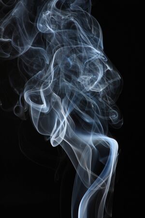 abstract white smoke on black の写真素材
