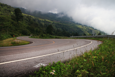 beautiful curve road on fog mountain  nature landscape outdoor  background.の写真素材
