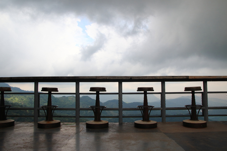 black chair steel and wood retro shadow in restaurant on fog and green hill background outdoor.の写真素材