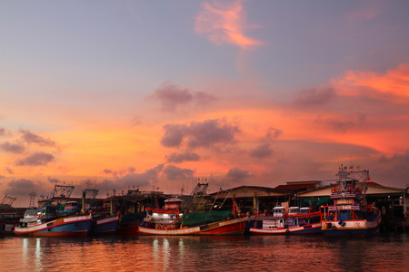 fishing wooden boat on shore sea  outdoor sunset  background.の写真素材