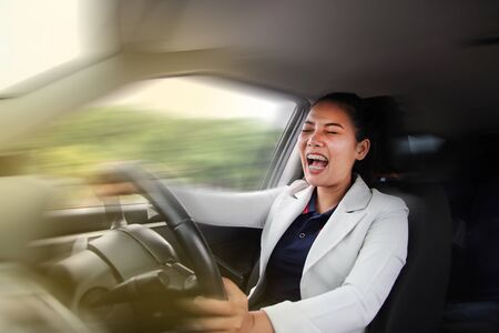 Careless Woman business accident while driving and shocked, unable to force the car