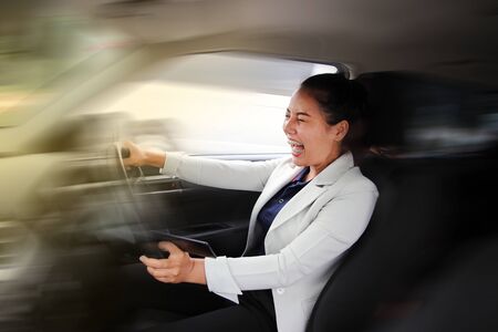 Careless Woman business accident while driving and shocked, unable to force the car