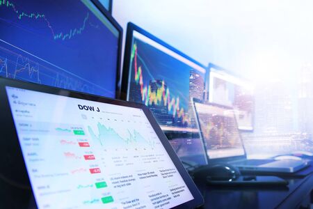 Computer appliances using in stock analysis for investment backgroundの写真素材