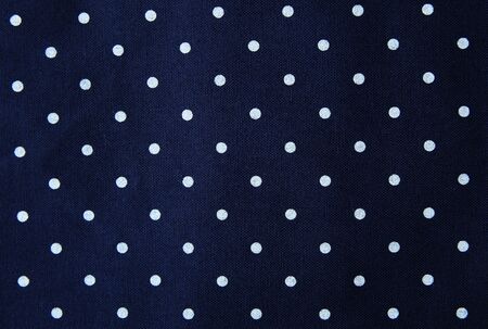 White dot pattern on Blue fabric background.Abstract pattern fabric.の写真素材
