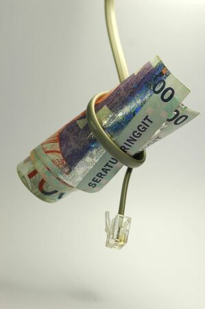 100 Malaysia ringgit with LAN Cable の写真素材