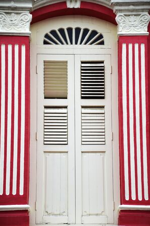 Red facade in chinatown, singaporeの写真素材
