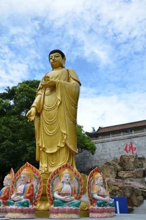 Giant buddha statue with blue skyの写真素材