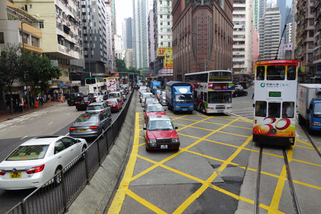 HONG KONG - NOV 21: Unidentified people travel by using various type of public transport in Hong Kong on November 21, 2014. Most than 90 percent of the people in Hong Kong use public transport daily.のeditorial素材