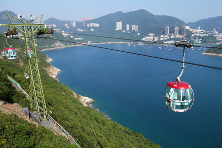 HONG KONG-NOV 21: Tourists travel in cable car in the ocean park, Hong Kong on on November 19, 2014. Cable cars is one of attraction in the park.のeditorial素材