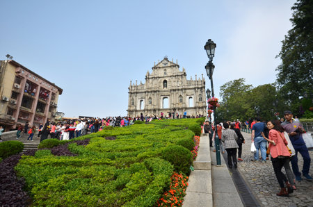 MACAU-NOVEMBER 19 : Tourists visit the ruined church of St Paul on 19 November 2014 in Macau, China. The ruined church of St Paul was inscribed on the UNESCO World Heritage List in 2005.のeditorial素材