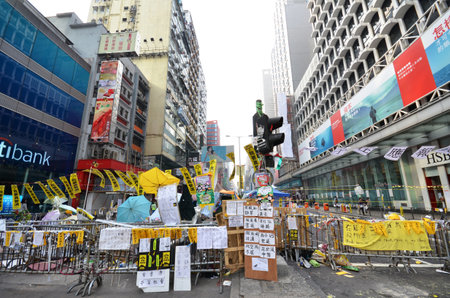 HONG KONG, NOV 23: Roadblock is set up to prevent police to conduct the raid in Mong Kok on 23 November 2014. Hong Kong activists are fighting for their right to choice for the next chief executive.のeditorial素材