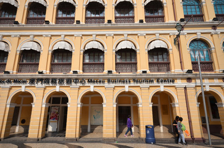 MACAU, CHINA - NOV 19: Tourists visit historical buildings surround the Leal Senado Squarein Macau on November 19, 2014. Macau is a former Portuguese colony.のeditorial素材