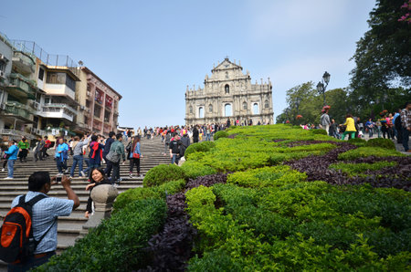 MACAU-NOVEMBER 19 : Tourists visit the ruined church of St Paul on 19 November 2014 in Macau, China. The ruined church of St Paul was inscribed on the UNESCO World Heritage List in 2005.のeditorial素材