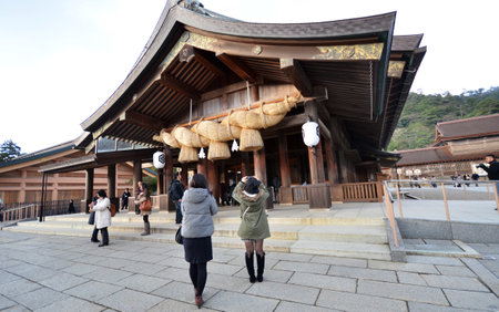 IZUMO, JAPAN -DEC 06: Tourists visit Izumo-taisha on December 06, 2014 in Kyoto. Izumo-taisha is one of the most ancient and important Shinto shrines in Japan.のeditorial素材