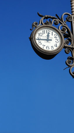 COMO, ITALY, JAN 26: A clock outside a building in Lake Como in Varenna, Italy on January 26, 2015....