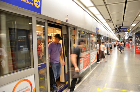 BANGKOK THAILAND - MAR 27: Passengers wait for train in a Metropolitan Rapid Transit (MRT) subway train station on March 27 2015 in Bangkok. Thailand. The MRT serves 240000 people daily with 18 stations and 27 km of track.のeditorial素材