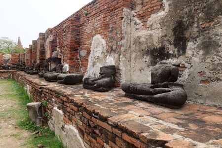 Ancient Buddha statue at Wat Yai Chaimongkol in the historical city, Ayutthaya, Thailandの写真素材