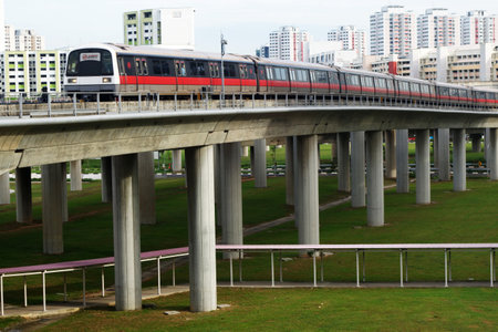 SIGNAPORE - JUL 17, 2015:Singapore mass rapid train (MRT) travels on the track in Jurong East,...