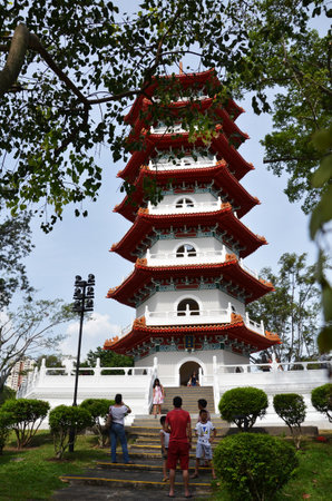 SINGAPORE- JUL 21: Tourists visit the big pagoda in the Chinese garden, Singapore on July 21, 2015. The Chinese Gardens concept is based on Chinese gardening art.のeditorial素材