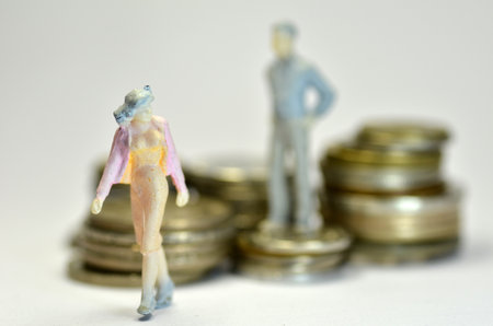 Miniature people with coins. Business and finance conceptのeditorial素材