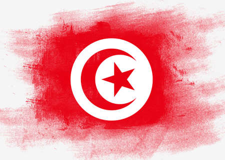 Flag of Tunisia painted with brush on solid background,の写真素材