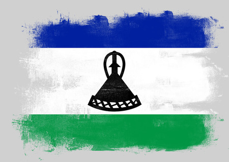 Flag of Lesotho painted with brush on solid background,の写真素材