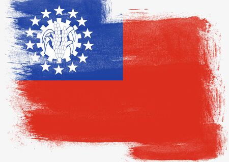 Flag of Myanmar painted with brush on solid background,の写真素材