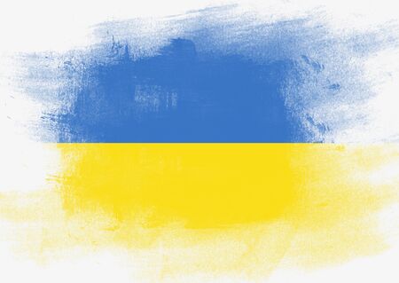 Flag of Ukraine painted with brush on solid background,の写真素材