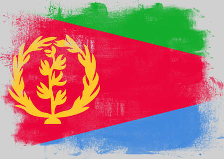 Flag of Eritrea painted with brush on solid background,の写真素材