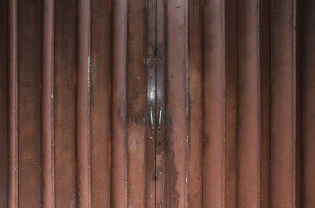 Background of old metal door in grungy style.の写真素材