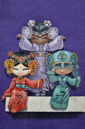 PENANG, MALAYSIA - NOV 26, 2015: Colorful street art painting of three Chinese dolls in George Town, Penang, Malaysia.のeditorial素材