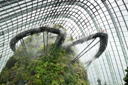 SINGAPORE-April 23, 2016: Unidentified tourists visit Flower Dome Cloud Forest to see the flowers and plants in  Garden by the Bay, Singapore on April 23, 2016.のeditorial素材
