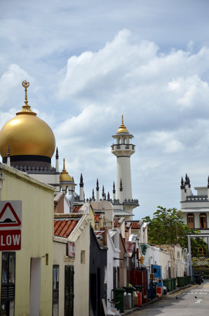 SINGAPORE - OCT 16, 2016: Street view of Singapore with Masjid Sultan. The mosque is considered one of the most important mosques in Singapore.のeditorial素材