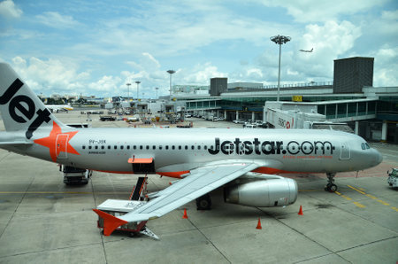 SINGAPORE - 18 NOV, 2016: Jetstar aircraft in Singapore Changi Airport. Jetstar Airways Pty Ltd is an Australian low cost airline headquartered in Melbourne, Australia.のeditorial素材