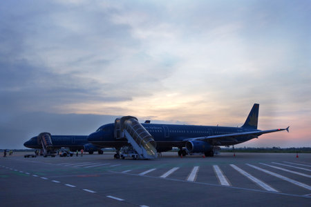 DANANG, VIETNAM - OCT 20, 2016: Civil aircrafts parking at Danang International airport in Danang, Vietnam.のeditorial素材