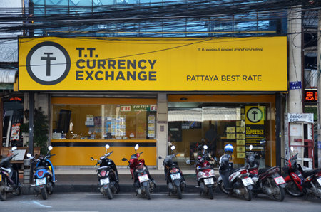 PATTAYA, THAILAND - 22 NOV, 2016: Money exchange shop on the corner of a street in Pattaya, Thailand.のeditorial素材