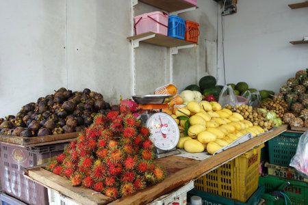 PATTAYA, THAILAND - 22 NOV, 2016: Thai people sells various type of fruits in a market in Pattaya, Thailand.のeditorial素材