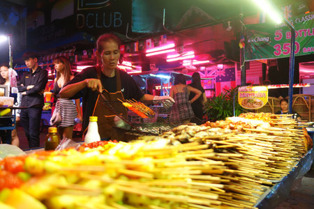 PATTAYA, THAILAND - 19 NOV, 2016: Street food stall in Pattaya. Street food is ready-to-eat food or drink sold by a hawker, or vendor, in a street or other public place, such as at a market or fair.のeditorial素材