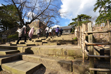 SHIMANE, JAPAN - DECEMBER 06, 2016: Tourists visit Matsue samurai feudal castle in Shimane prefecture. This castle also known as Black castle in Shimane prefecture.のeditorial素材